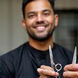 Jason Lee, holding grooming scissors